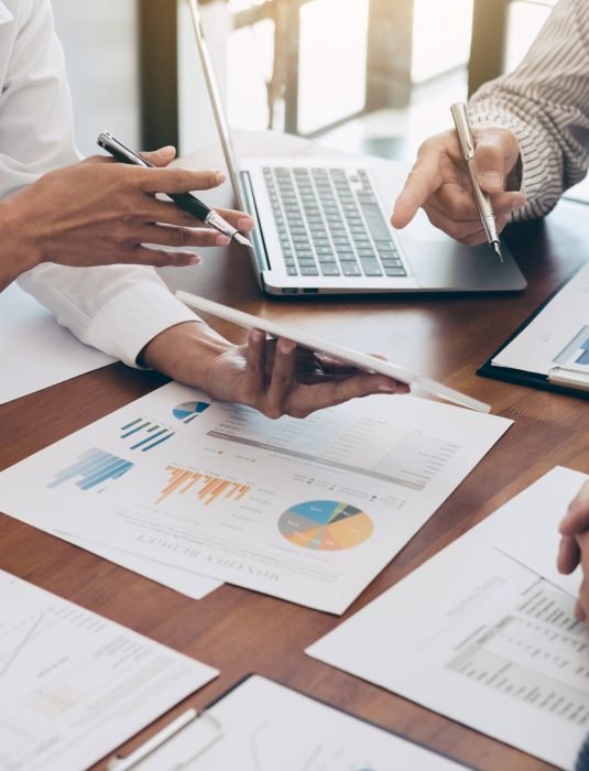 Business team colleagues meeting to conference professional investor working and discussing a new marketing business strategy project, Business finance and accounting concept.